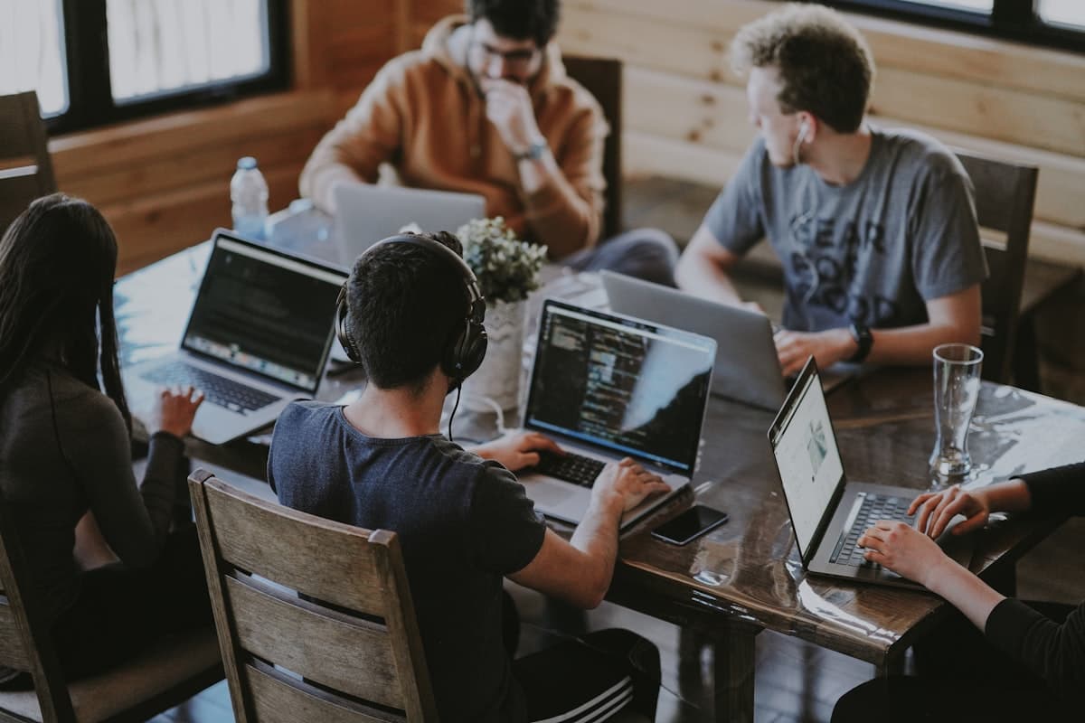 Working on a laptop outdoors in nature — remote work with Starlink