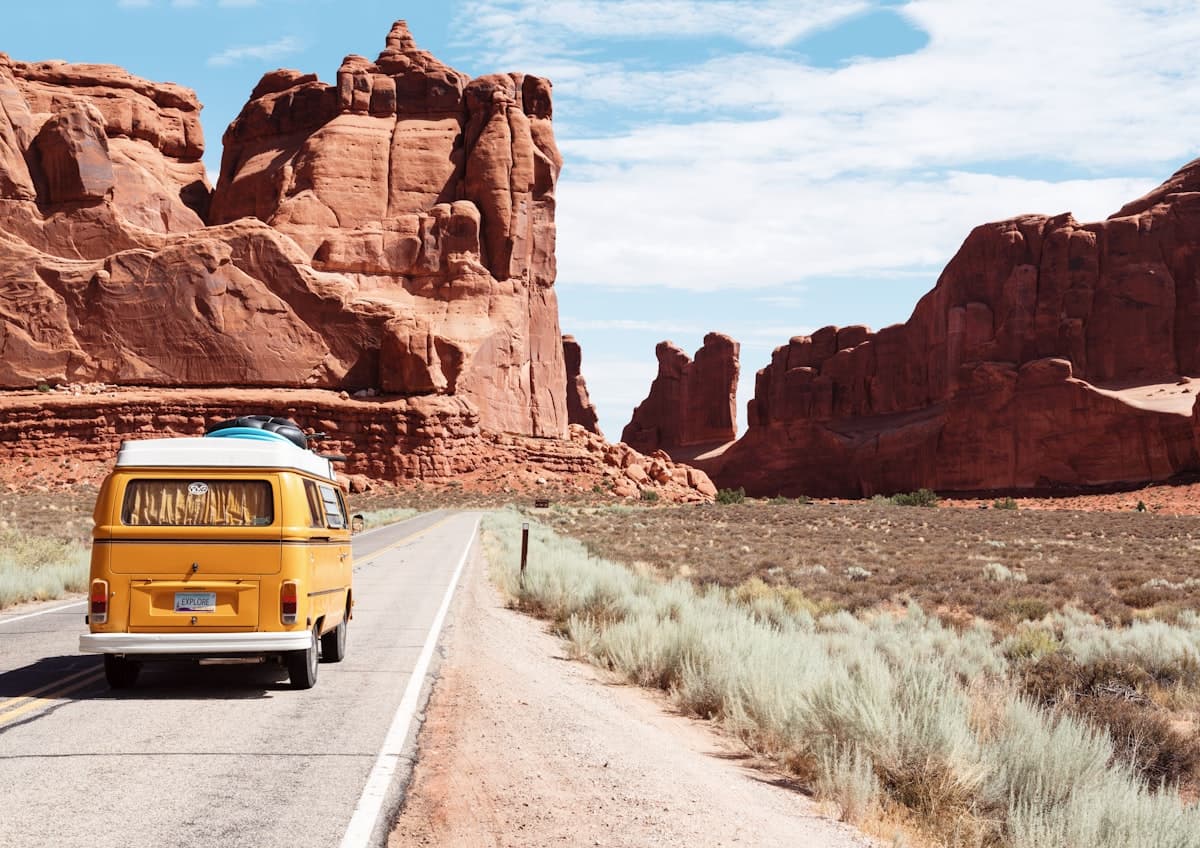 Road trip through open highway — stay connected while traveling